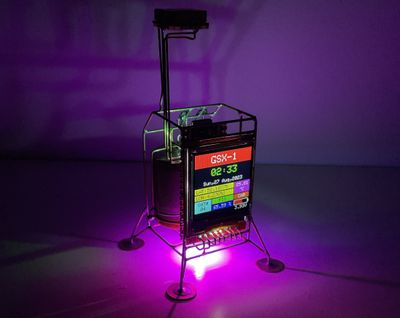 GSX-1 wireframe sculpture on a dark background