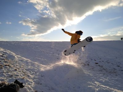 Snowboarding in the mountains